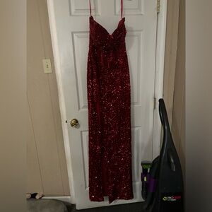 Size 10 red dress worn once for sweet 16 zip up with slit on the side